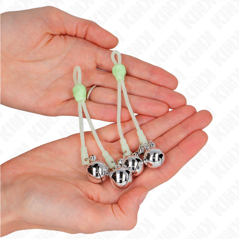 KINK - PINCES À TÉTONS TÊTE DE MORT LUMINEUSES AVEC PETITES CLOCHES RÉGLABLES VERT/ARGENT