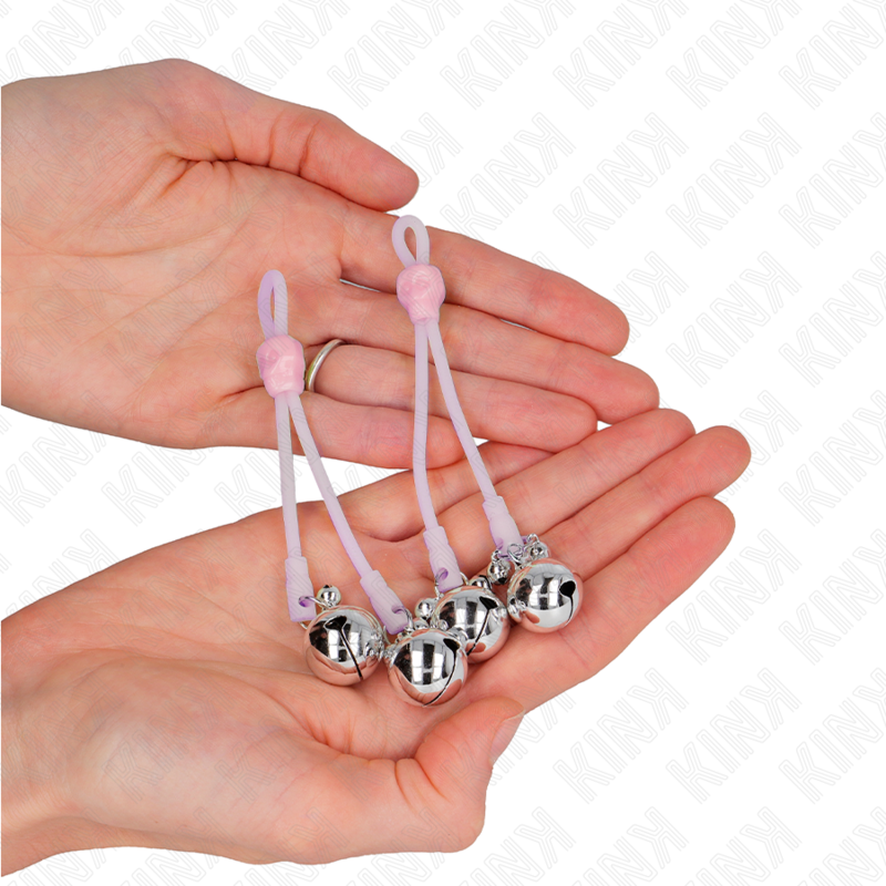 KINK - SERRE-TÉTONS CRÂNE LUMINEUX AVEC ANNEAU À CLOCHETTES AJUSTABLES ROSE/ARGENT