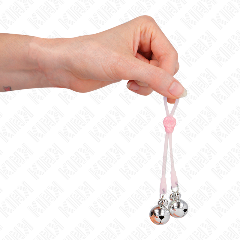 KINK - SERRE-TÉTONS CRÂNE LUMINEUX AVEC ANNEAU À CLOCHETTES AJUSTABLES ROSE/ARGENT