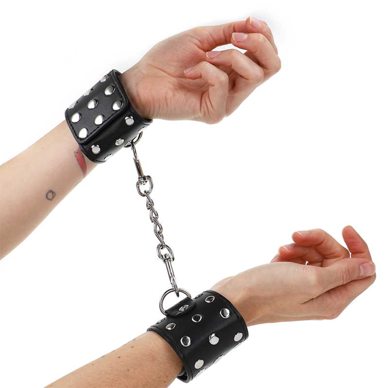 KINK - MENOTTES AVEC FERMETURE À PRESSION PLEINES DE CLOUS NOIR RÉGLABLE 19-24 CM X 5,5 CM