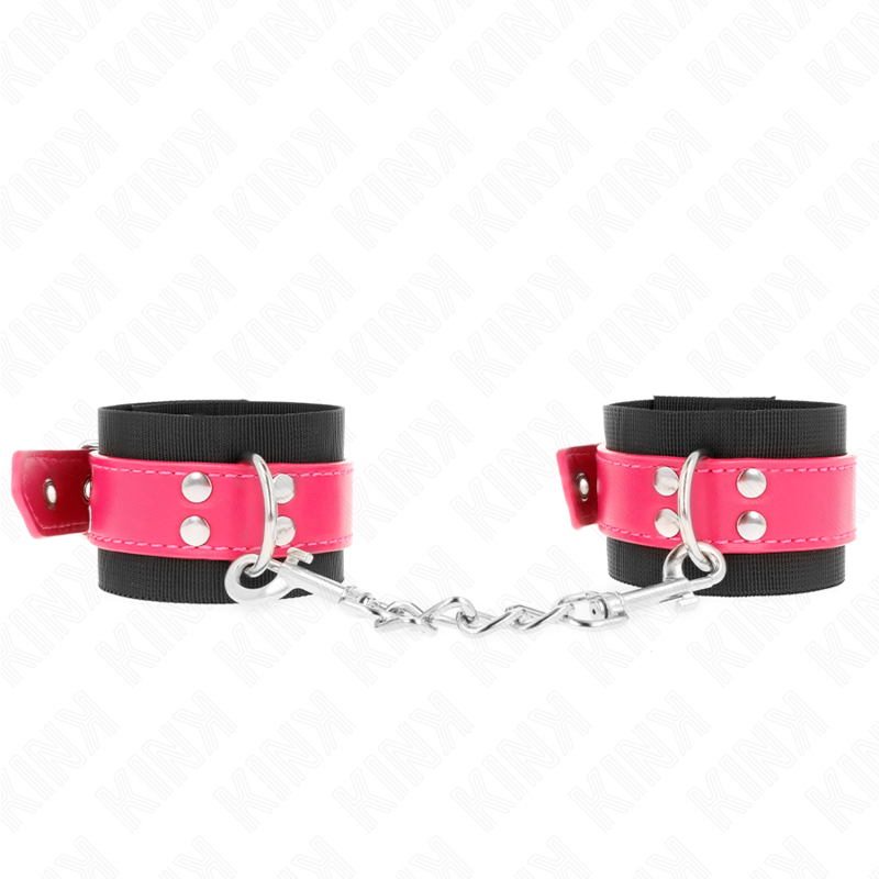 KINK - MENOTTES EN NYLON NOIR AVEC SANGLE EN SIMILICUIR ROSE FRAMBOISE RÉGLABLES 19-29 CM X 5,1 CM