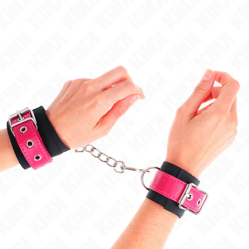 KINK - MENOTTES EN NYLON NOIR AVEC SANGLE EN SIMILICUIR ROSE FRAMBOISE RÉGLABLES 19-29 CM X 5,1 CM