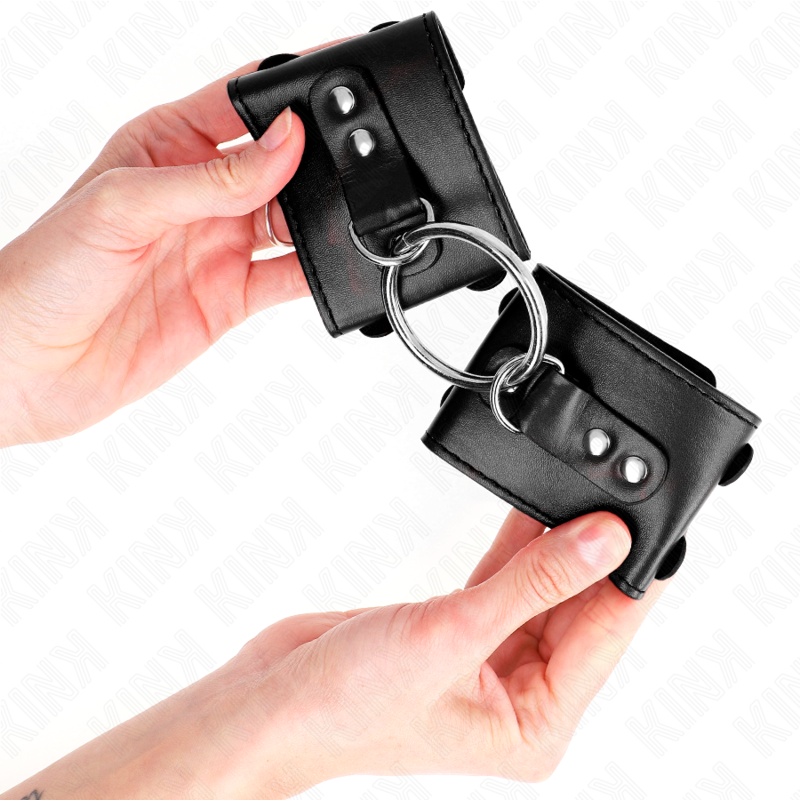 KINK - MENOTTES RIGIDES AVEC ANNEAU ET RIVETS RÉGLABLES NOIRES 17-22 CM X 6,5 CM