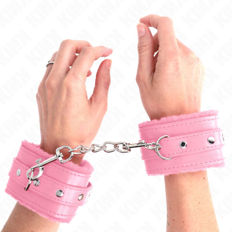 KINK - MENOTTES REMBOURRÉES EN FOURRURE PREMIUM ROSES AVEC CEINTURE ROSE RÉGLABLES 17-29 CM X 6 CM