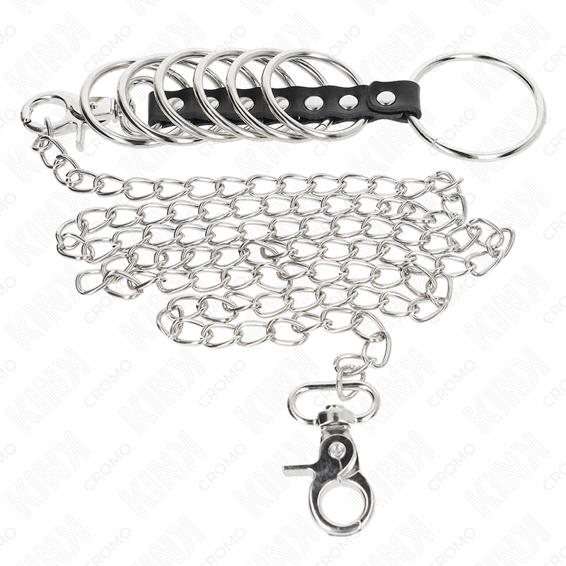 KINK - 7 ANNEAUX PÉNILIENS EN MÉTAL DE 3,8 CM À 5 CM RELIÉS PAR DU CUIR ET UNE CHAÎNE EN MÉTAL DE 100 CM